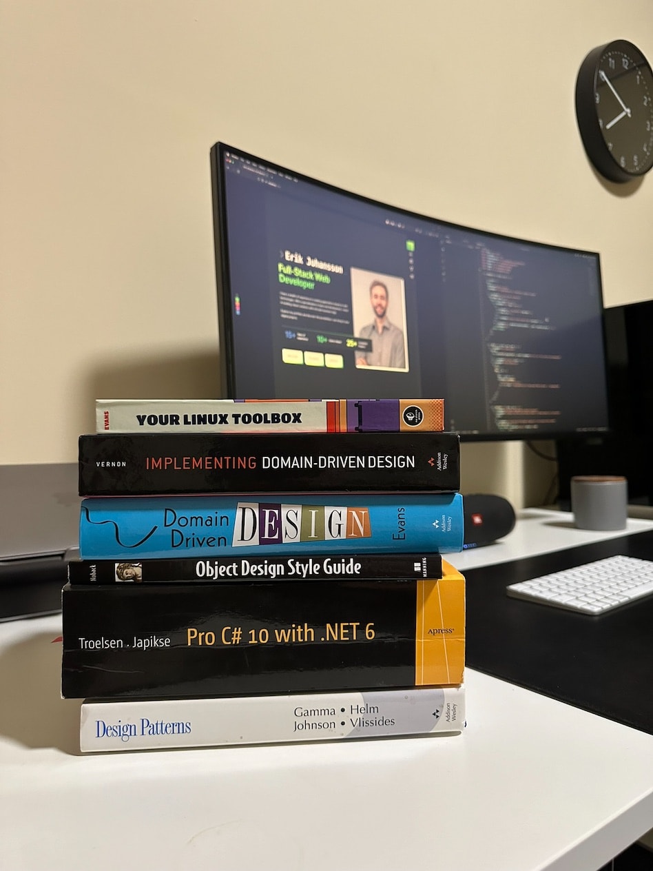 Photo of book and Erik Johansson's desk & computer